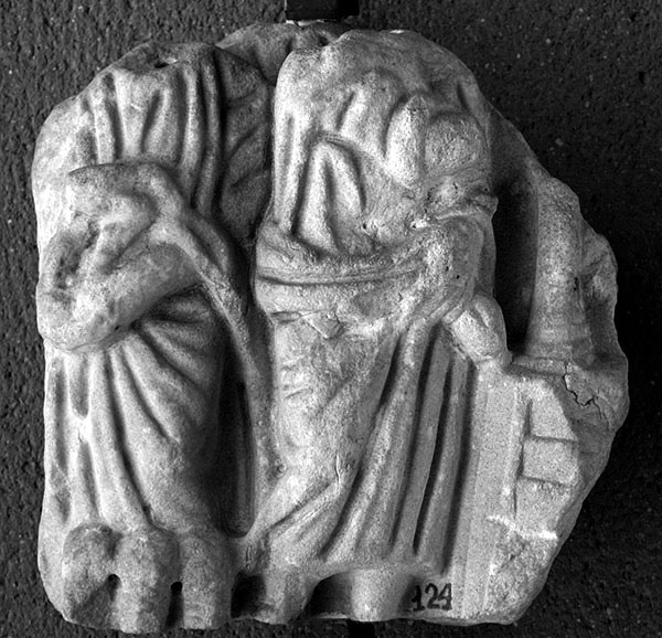 Sarcophagus fragment showing multiplication of loaves with a wand